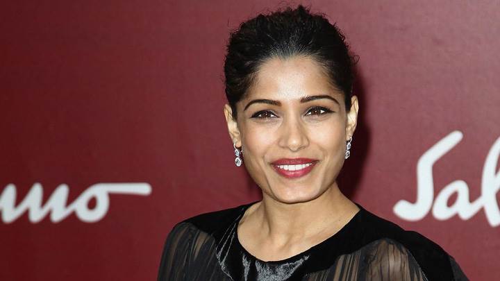 Smiling Freida Pinto At Salvatore Ferragamo Show